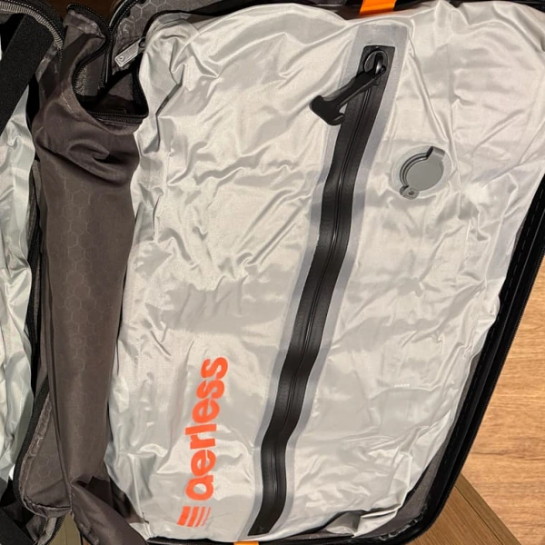 Daniel R.'s Aerless bags packed inside his suitcase