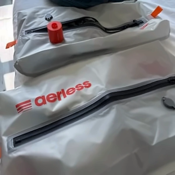 Emma L.'s Aerless bags and pump packed for vacation